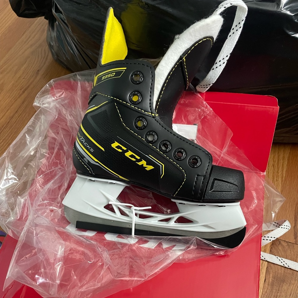 NWT ice hockey skates, toddler size 10! We outgrew these before we got to use